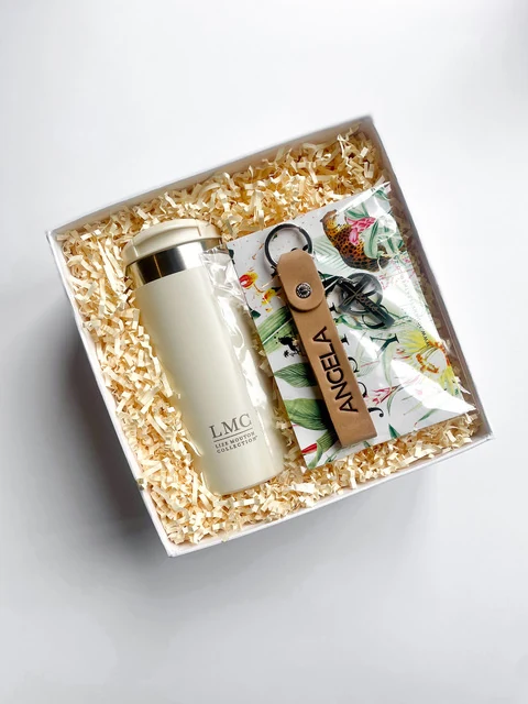 Gold gift box with insulated bottle, nougat and locally sourced treats
